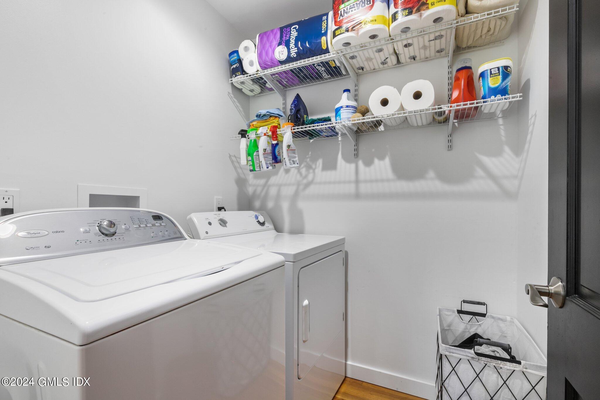 300 Orchard Street Greenwich, CT 06830 - Photo 19 of 40 a utility room with dryer and washer