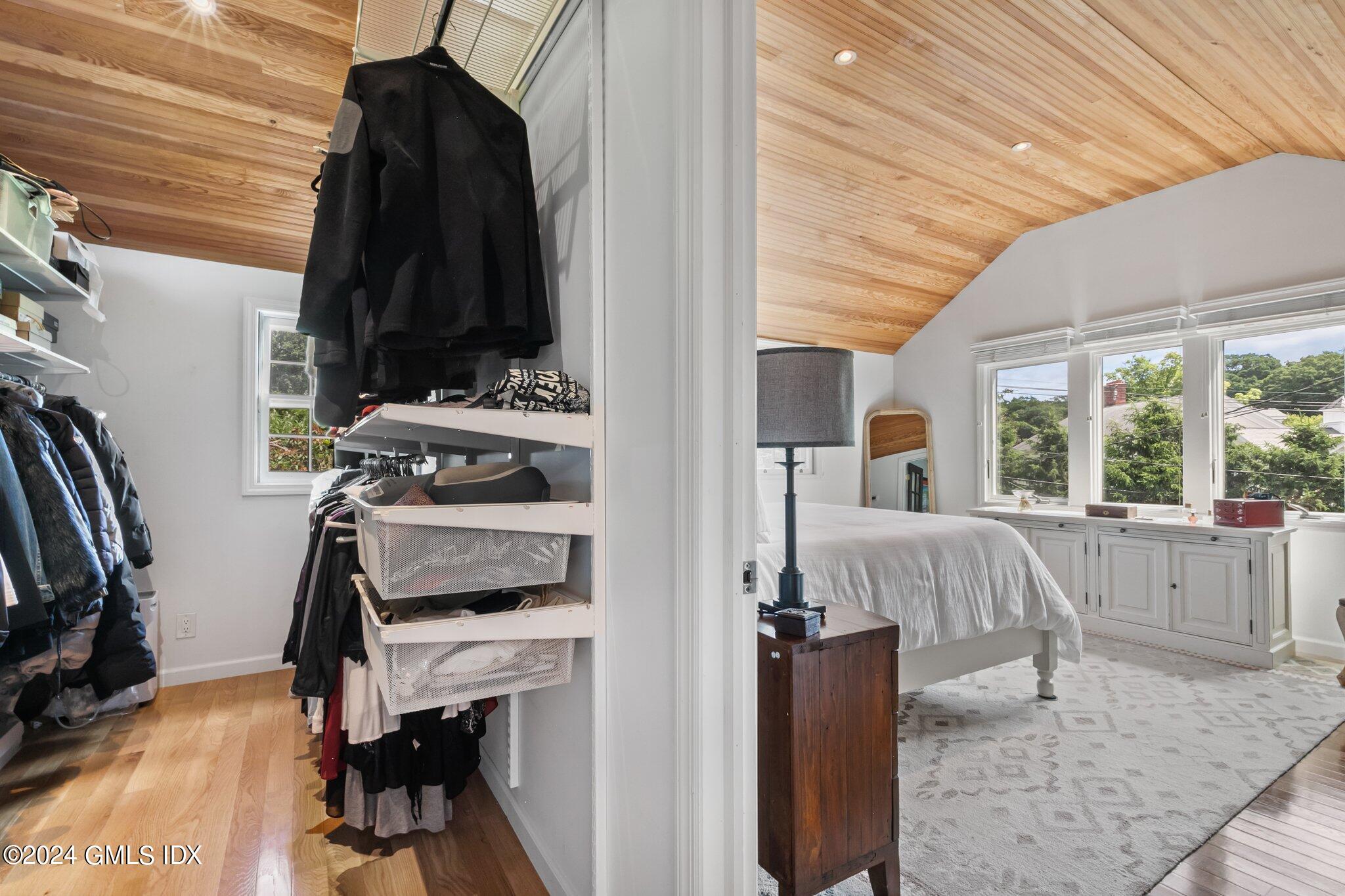 300 Orchard Street Greenwich, CT 06830 - Photo 23 of 40 a view of a bedroom with a window