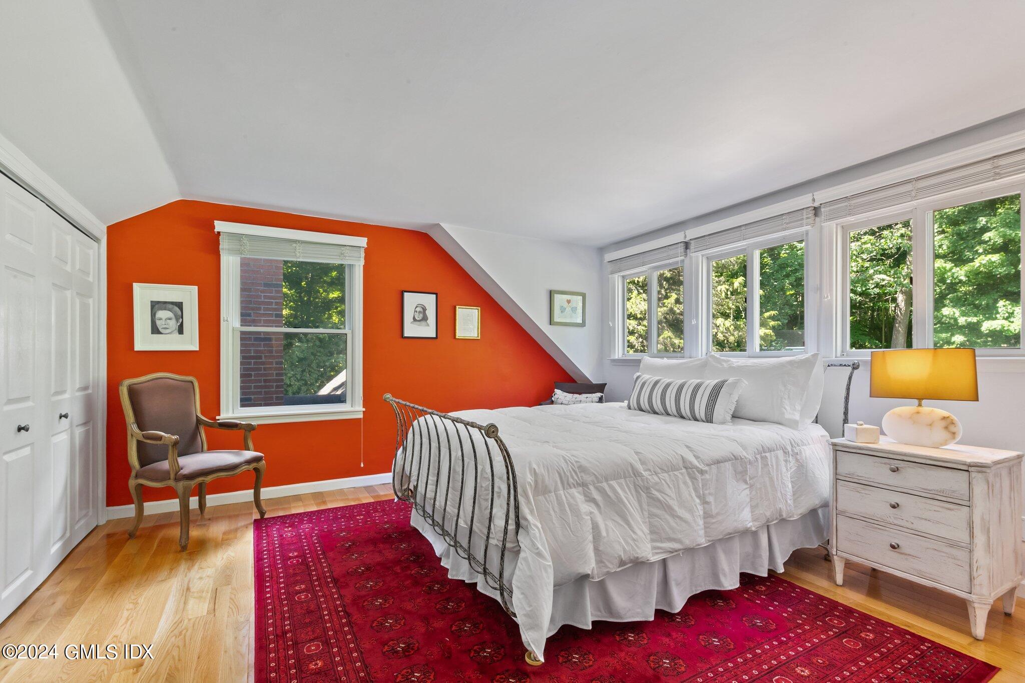 300 Orchard Street Greenwich, CT 06830 - Photo 31 of 40 a bedroom with a bed and a window