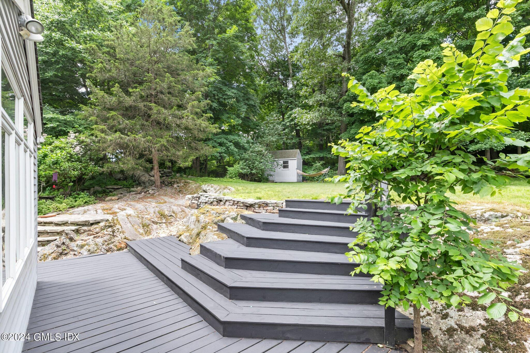 300 Orchard Street Greenwich, CT 06830 - Photo 33 of 40 a view of yard along with trees