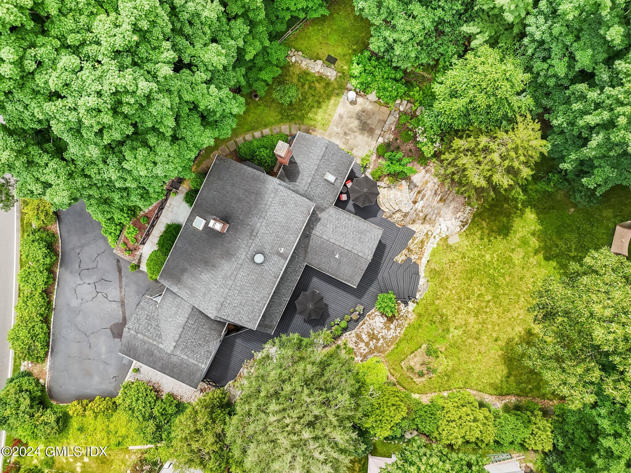 300 Orchard Street Greenwich, CT 06830 - Photo 38 of 40 an aerial view of a house with yard swimming pool and outdoor seating