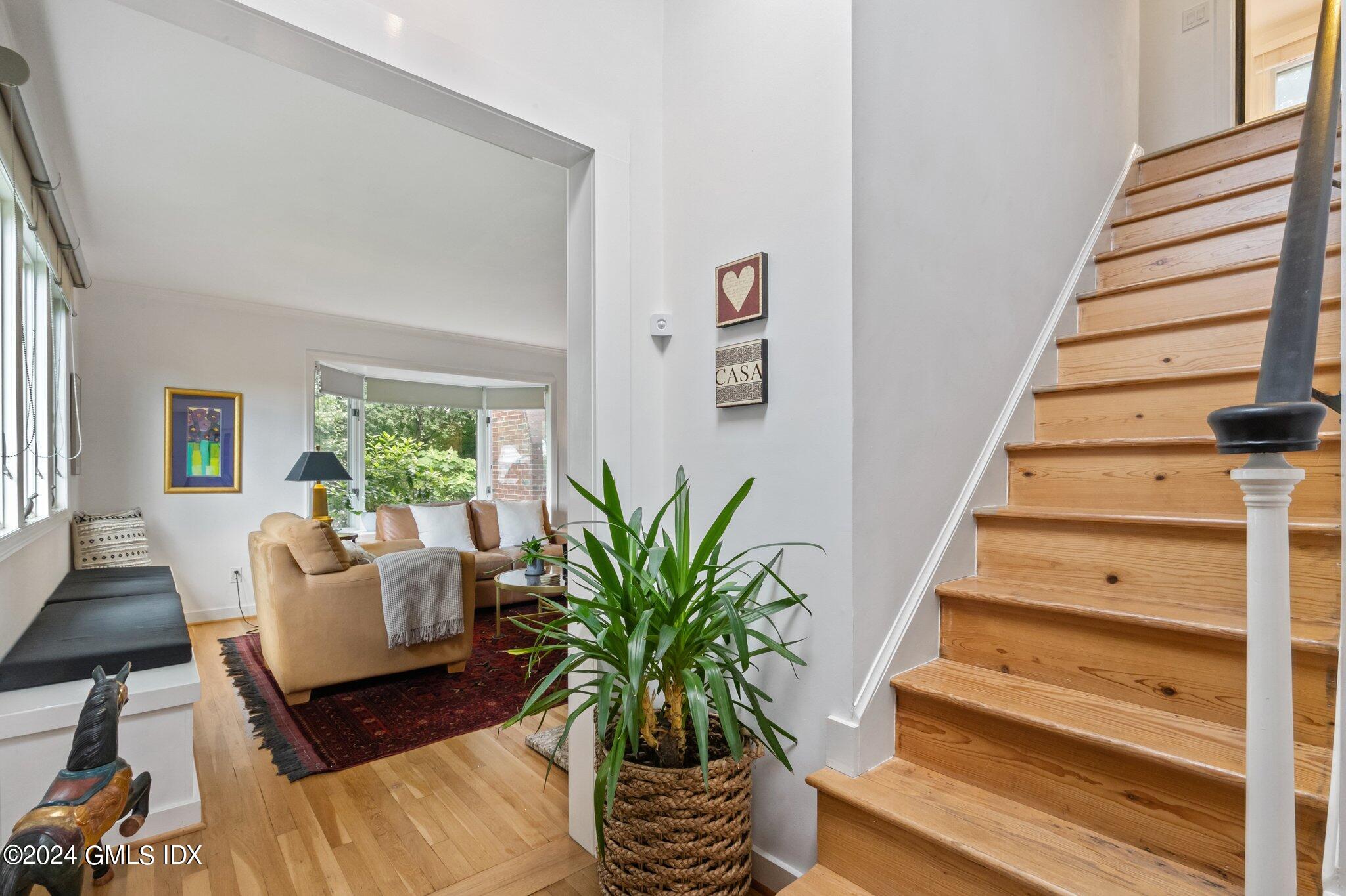 300 Orchard Street Greenwich, CT 06830 - Photo 5 of 40 a living room with furniture and wooden floor