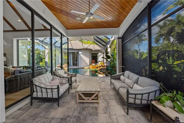 a outdoor living space with furniture and a potted plant