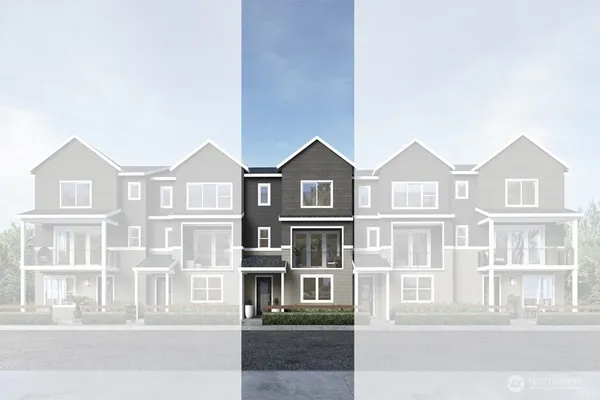 a front view of a residential apartment building with a yard