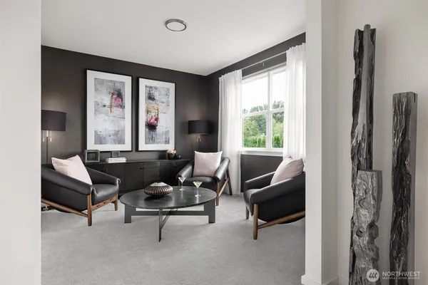 a living room with furniture large window and couch