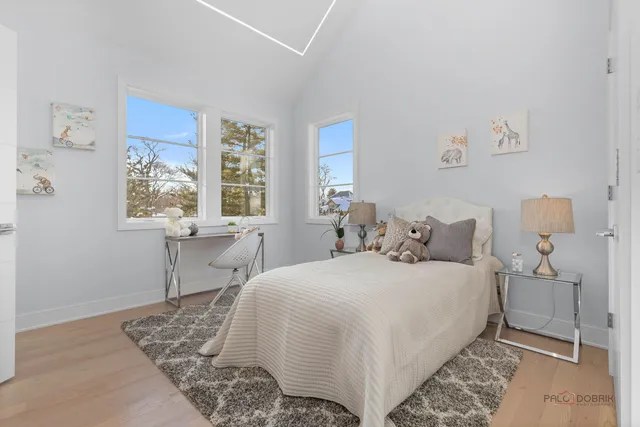 a utility room with sink dryer and washer