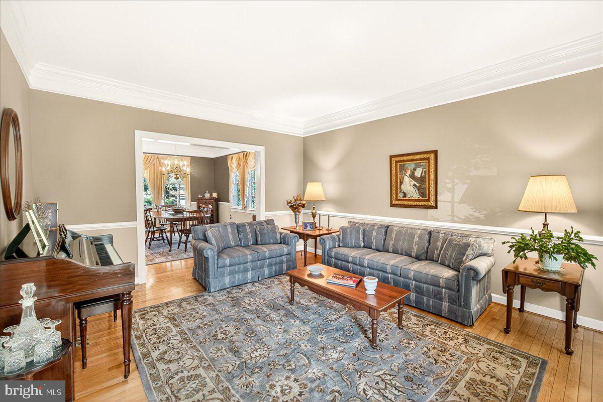 7010 Club House Circle New Market, MD 21774 - Photo 11 of 90 Formal Living Room w/HW Floors & natural light