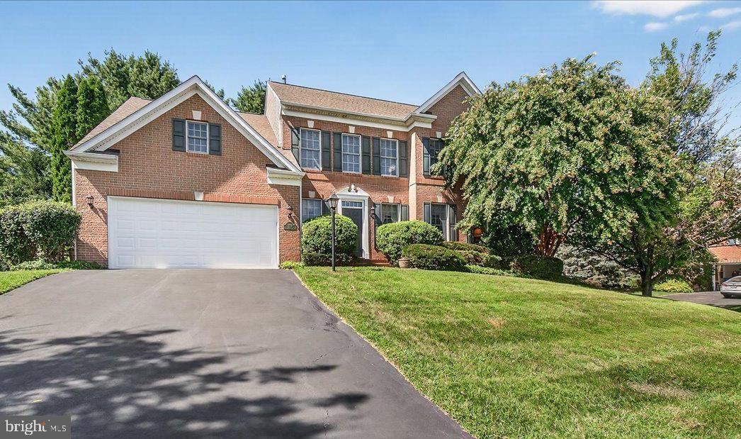 7010 Club House Circle New Market, MD 21774 - Photo 2 of 90 a front view of house with yard and green space