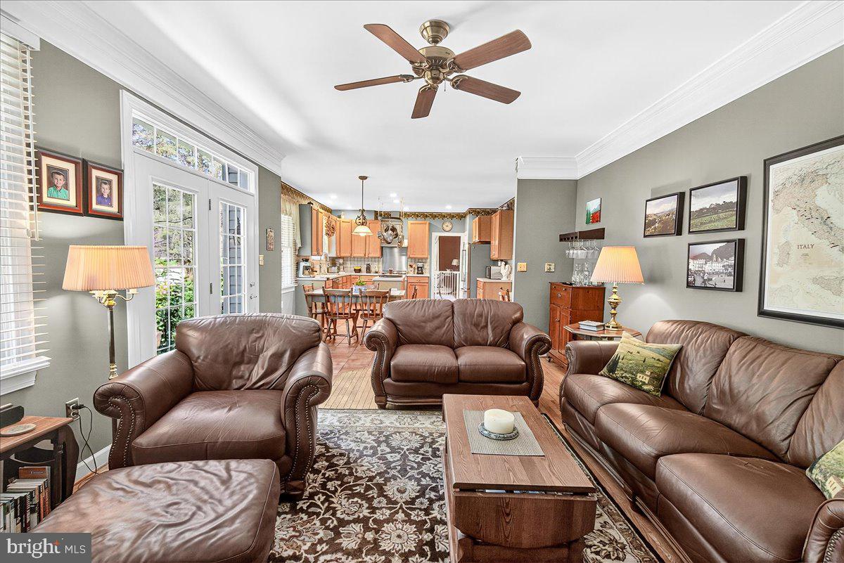 7010 Club House Circle New Market, MD 21774 - Photo 21 of 90 a living room with furniture and a large window