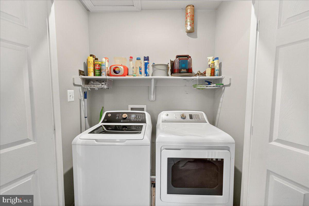 7010 Club House Circle New Market, MD 21774 - Photo 34 of 90 a utility room with dryer and washer