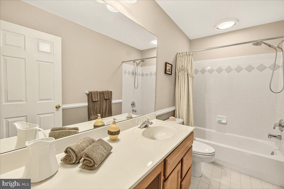 7010 Club House Circle New Market, MD 21774 - Photo 35 of 90 Upper level hall bath with large vanity & tub/show