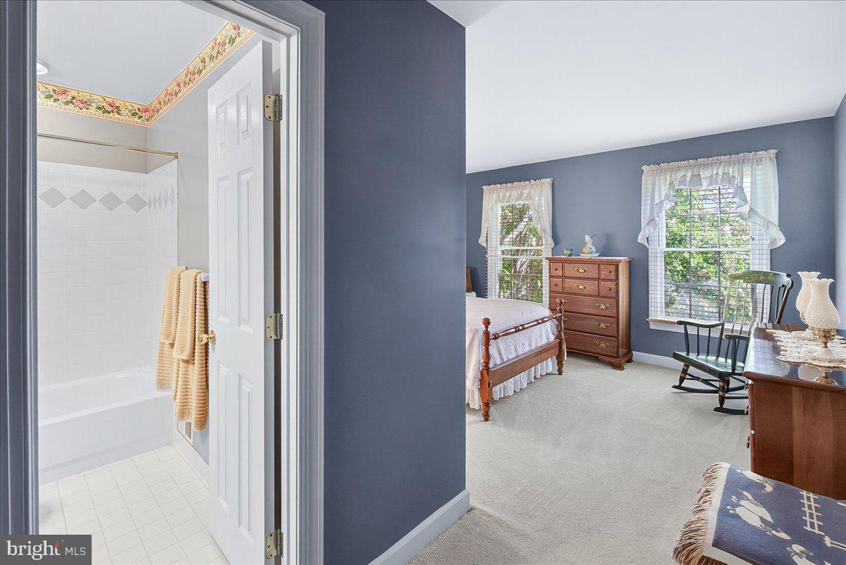 7010 Club House Circle New Market, MD 21774 - Photo 38 of 90 a room with furniture and a window