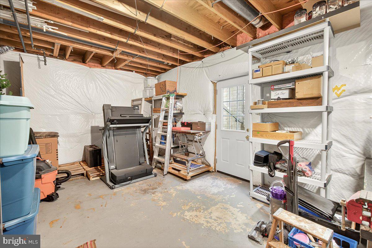 7010 Club House Circle New Market, MD 21774 - Photo 45 of 90 a view of a room with gym equipment