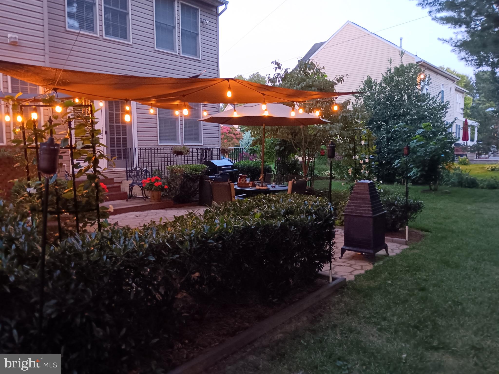7010 Club House Circle New Market, MD 21774 - Photo 48 of 90 a view of a chairs and table in backyard