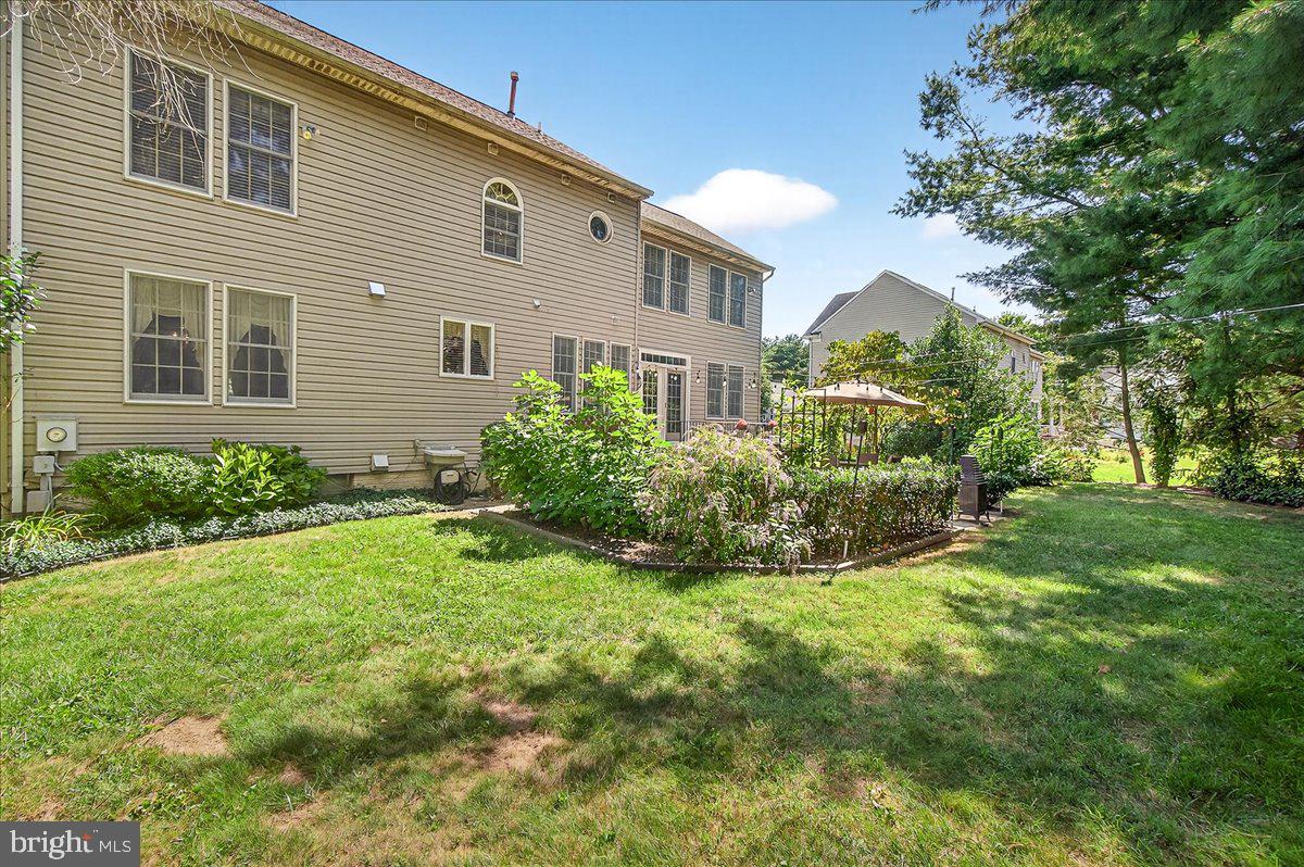 7010 Club House Circle New Market, MD 21774 - Photo 51 of 90 a view of backyard of house with green space