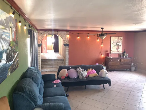 a bedroom with furniture and window