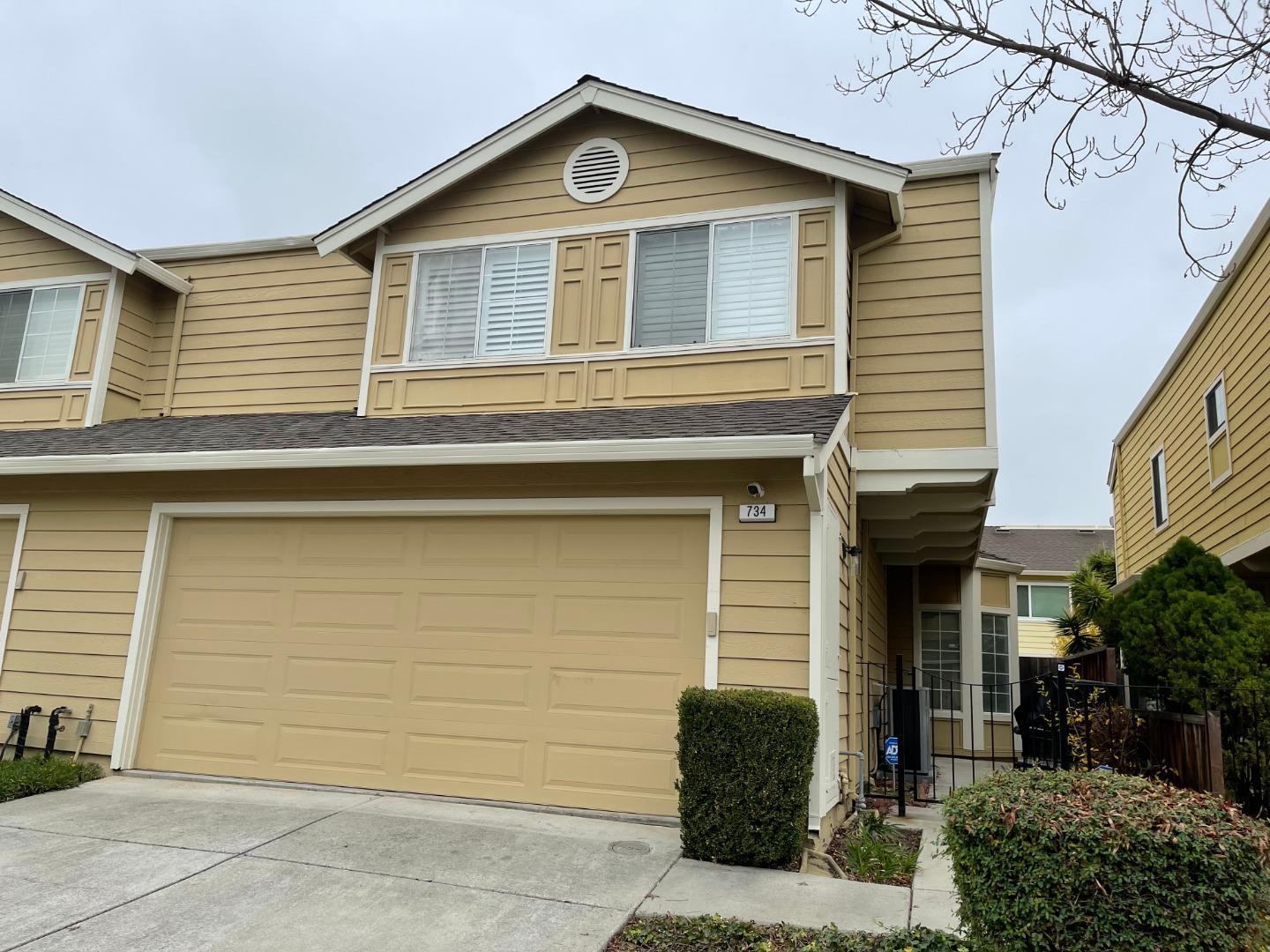 734 Jennifer Way Milpitas, CA 95035 - Photo 1 of 1 a front view of a house with garage