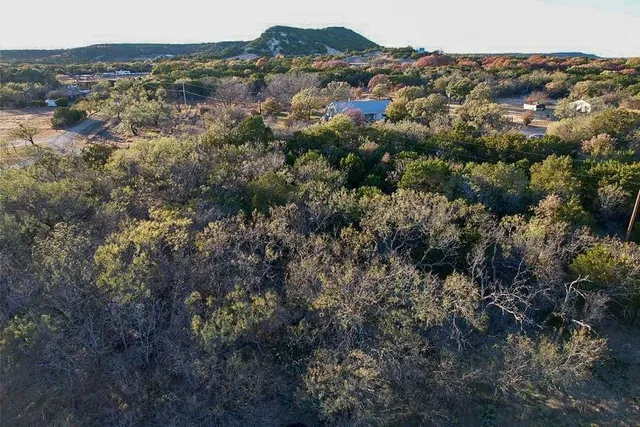 a view of a house with a mountain