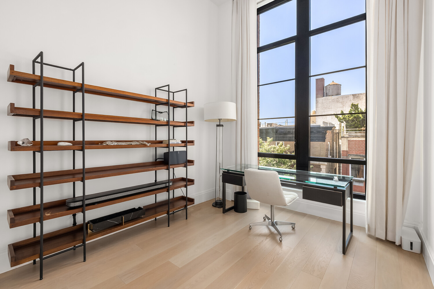 438 East 12th Street, Unit PHF Manhattan, NY 10009 - Photo 11 of 20 a view of a livingroom with furniture and windows