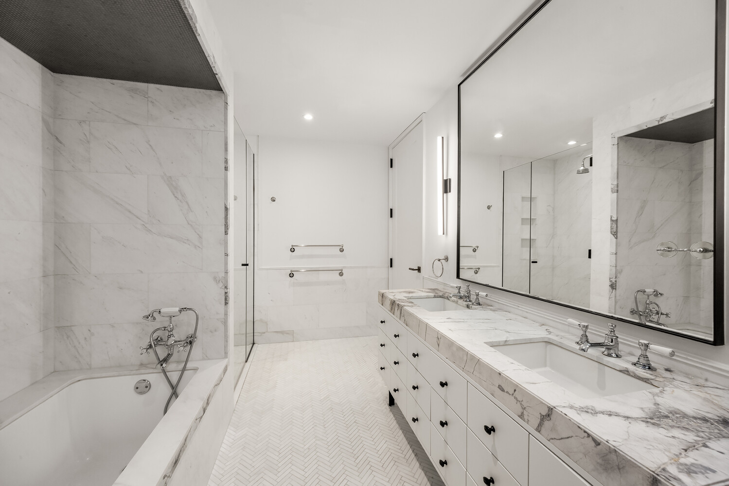 438 East 12th Street, Unit PHF Manhattan, NY 10009 - Photo 9 of 20 a bathroom with a granite countertop sink mirror and a bathtub