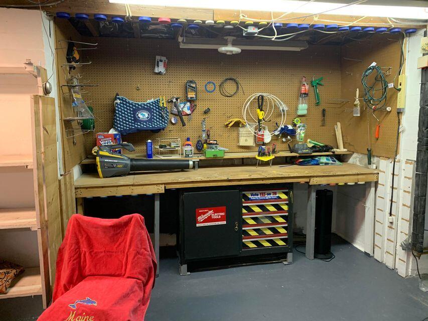 29 Somerset Street Millinocket, ME 04462 - Photo 28 of 38 work bench in cellar