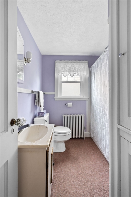 10 Shepard Street Marblehead, MA 01945 - Photo 22 of 42 a bathroom with a sink and a mirror