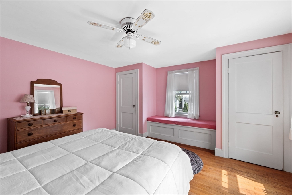 10 Shepard Street Marblehead, MA 01945 - Photo 24 of 42 a bedroom with a bed and a dresser