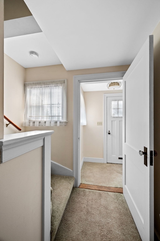 10 Shepard Street Marblehead, MA 01945 - Photo 25 of 42 wooden floor in an empty room with a window
