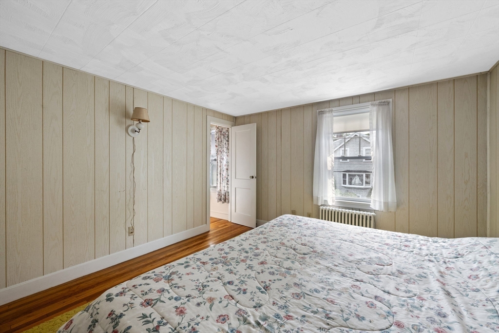 10 Shepard Street Marblehead, MA 01945 - Photo 29 of 42 a bedroom with a bed and a window