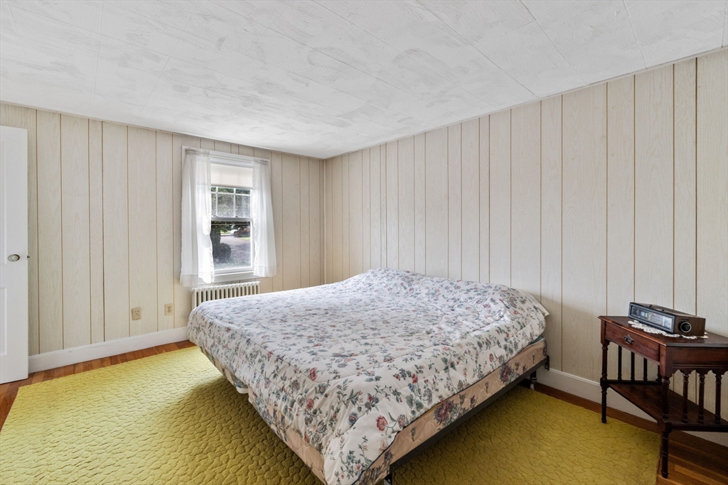 10 Shepard Street Marblehead, MA 01945 - Photo 30 of 42 a bedroom with a bed and a window