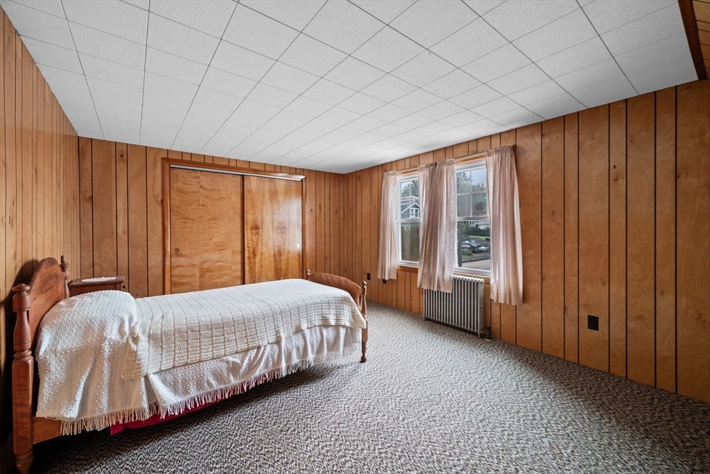 10 Shepard Street Marblehead, MA 01945 - Photo 32 of 42 a bedroom with a bed and a window