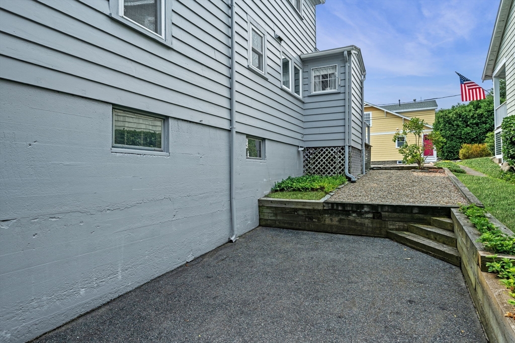 10 Shepard Street Marblehead, MA 01945 - Photo 6 of 42 a side of a house with a yard