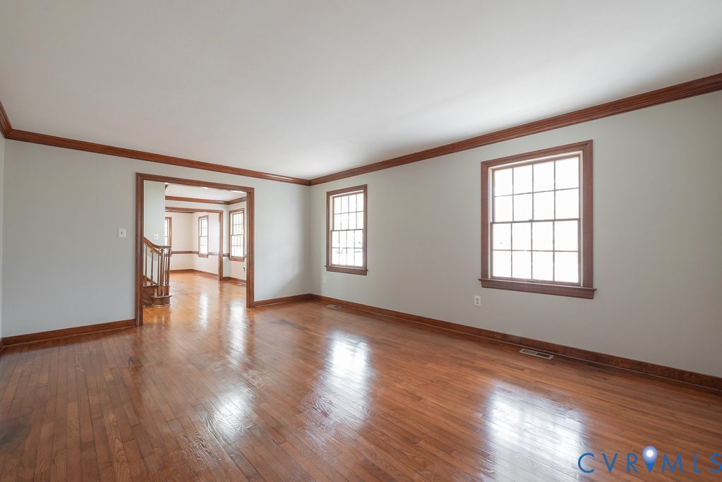 11030 Golden Leaf Road Chester, VA 23831 - Photo 23 of 50 Formal living room with ornamental molding, light