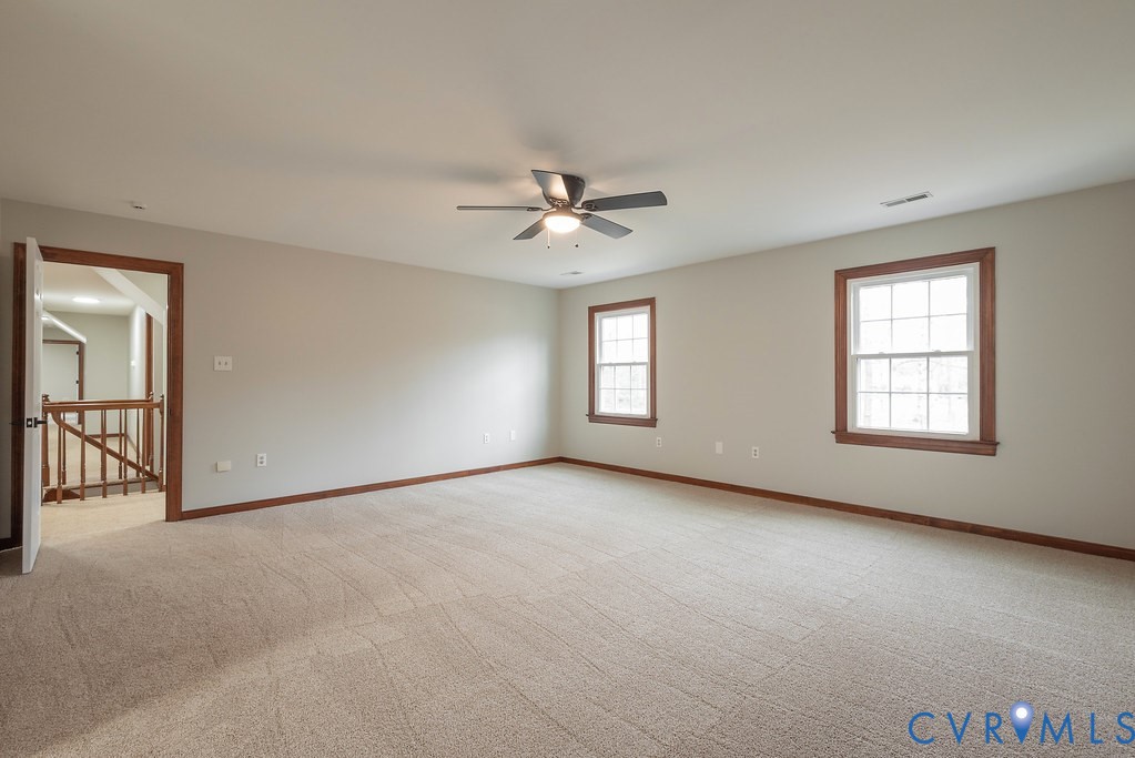 11030 Golden Leaf Road Chester, VA 23831 - Photo 24 of 50 Master bedroom featuring light carpet and a ceili