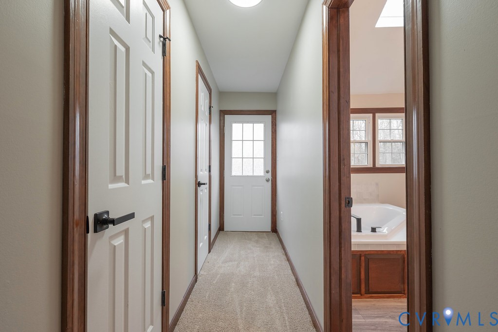 11030 Golden Leaf Road Chester, VA 23831 - Photo 31 of 50 Corridor featuring light carpet and baseboards