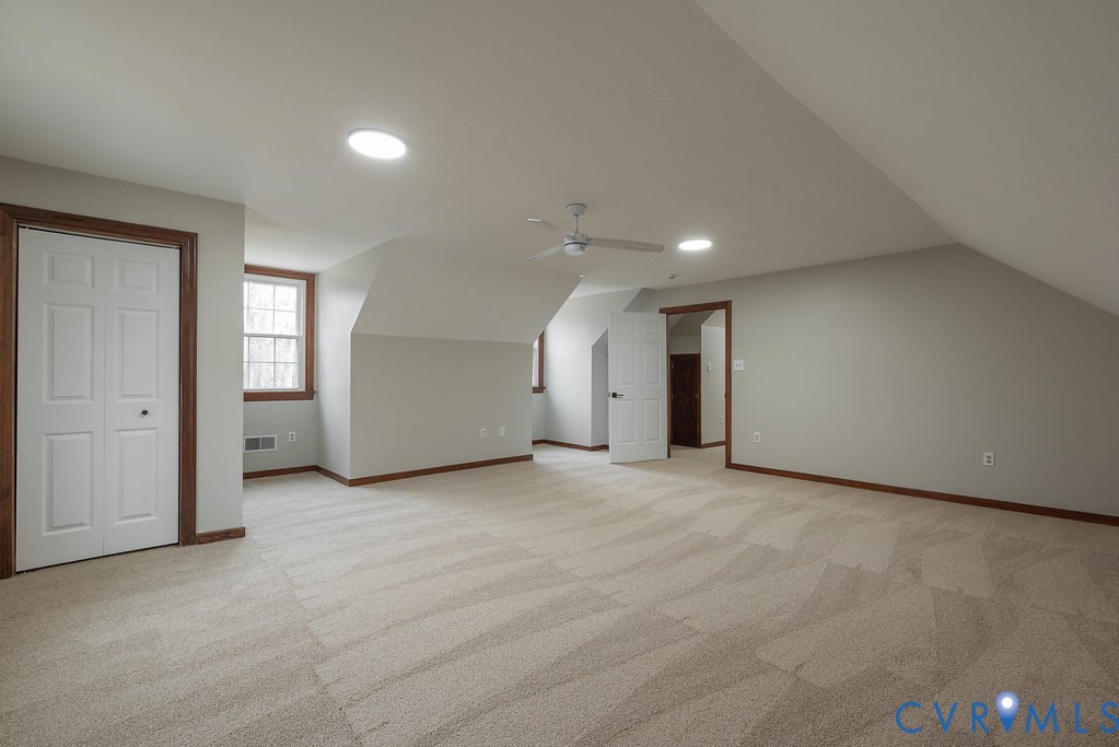 11030 Golden Leaf Road Chester, VA 23831 - Photo 36 of 50 Bonus room featuring vaulted ceiling, light colore