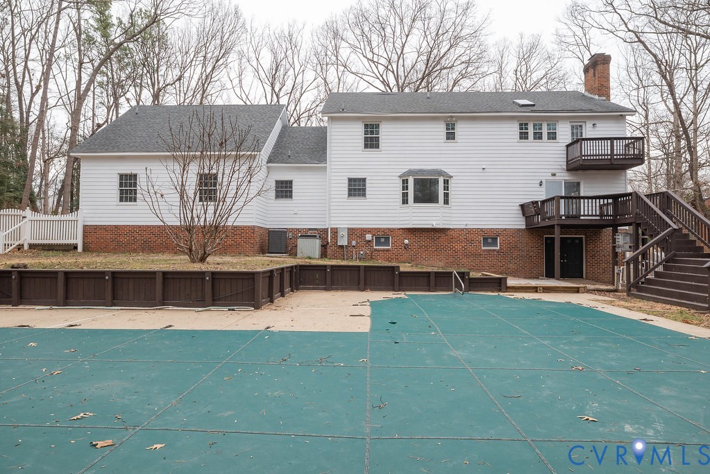 11030 Golden Leaf Road Chester, VA 23831 - Photo 48 of 50 Back of house with a deck, stairs, a chimney, and