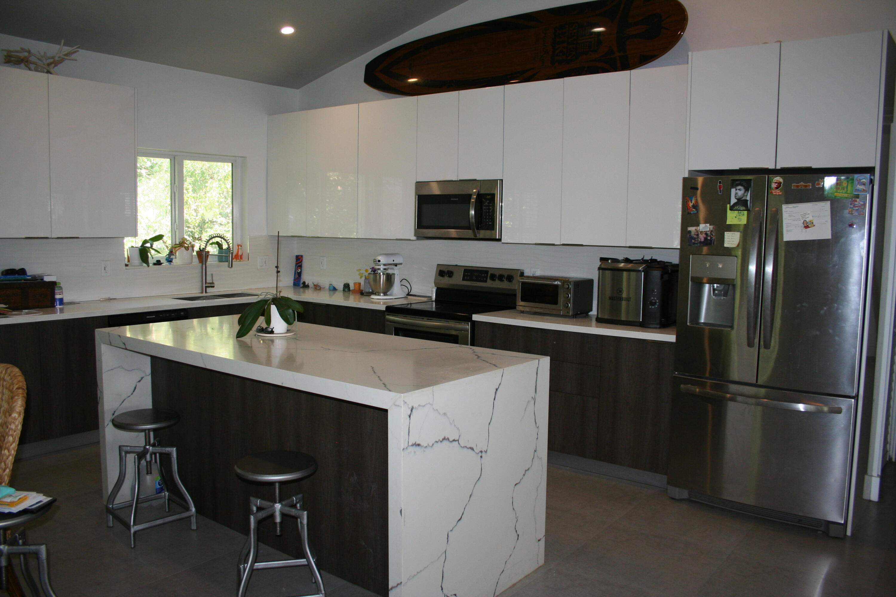 8 Bowen Drive Key Largo, FL 33037 - Photo 4 of 27 a kitchen with a sink stainless steel appliances and cabinets