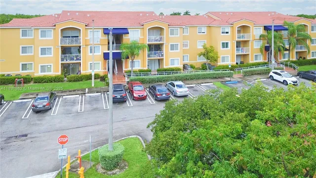 a front view of a building with outdoor seating