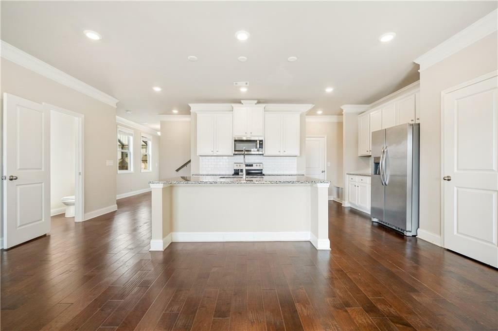 2747 Pearl Rdg Trace Buford, GA 30519 - Photo 11 of 41 a view of kitchen with stainless steel appliances refrigerator sink and cabinets