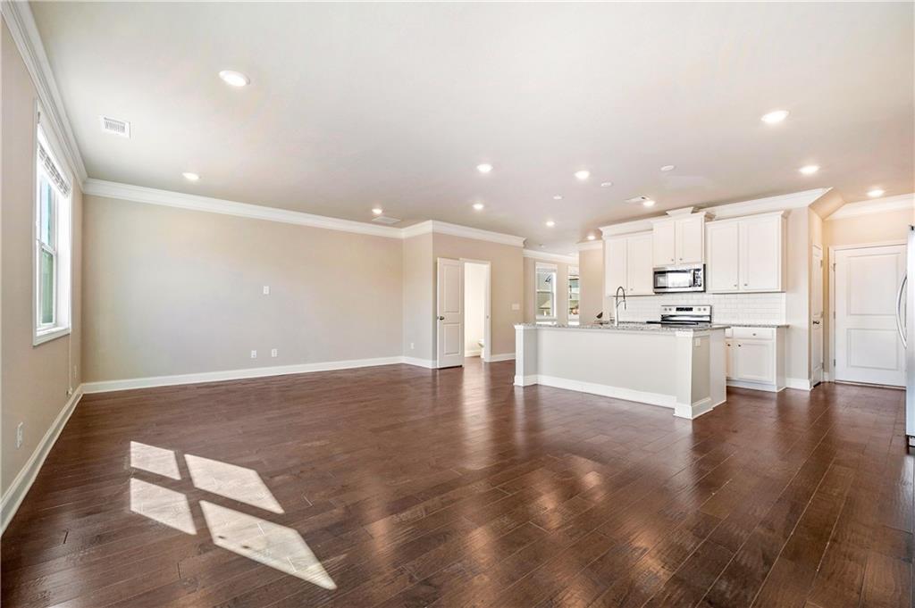 2747 Pearl Rdg Trace Buford, GA 30519 - Photo 12 of 41 a view of kitchen with kitchen island and stainless steel appliances