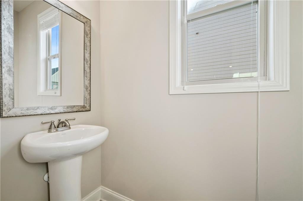 2747 Pearl Rdg Trace Buford, GA 30519 - Photo 16 of 41 a bathroom with a sink and a mirror