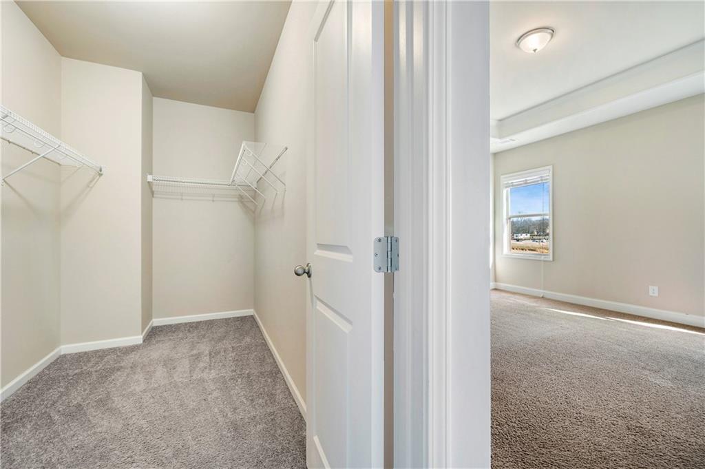 2747 Pearl Rdg Trace Buford, GA 30519 - Photo 21 of 41 a view of a hallway with a white walls