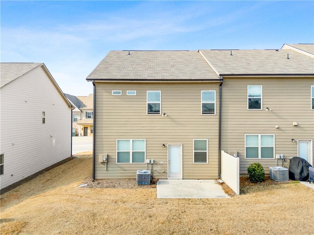 2747 Pearl Rdg Trace Buford, GA 30519 - Photo 33 of 41 a view of a house with a patio
