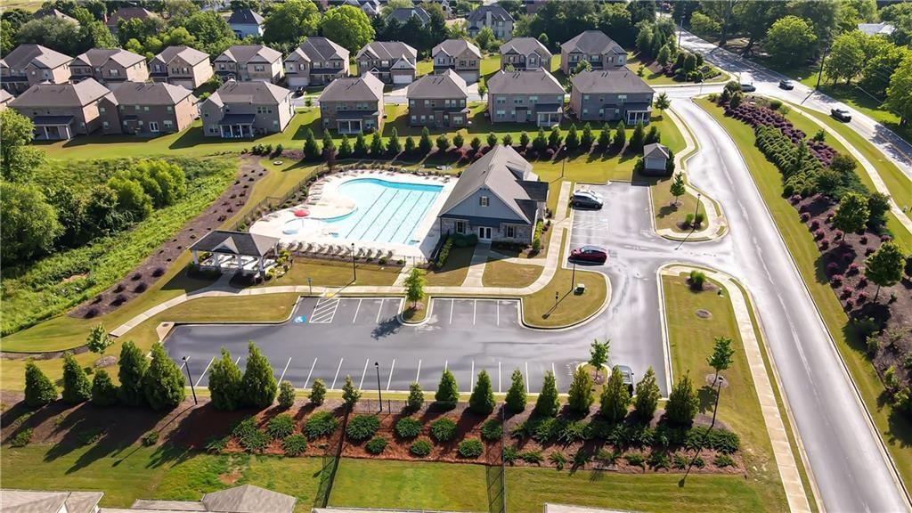 2747 Pearl Rdg Trace Buford, GA 30519 - Photo 37 of 41 an aerial view of residential houses with outdoor space and swimming pool