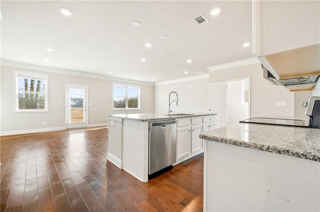 2747 Pearl Rdg Trace Buford, GA 30519 - Photo 5 of 41 a view of kitchen with sink and wooden floor