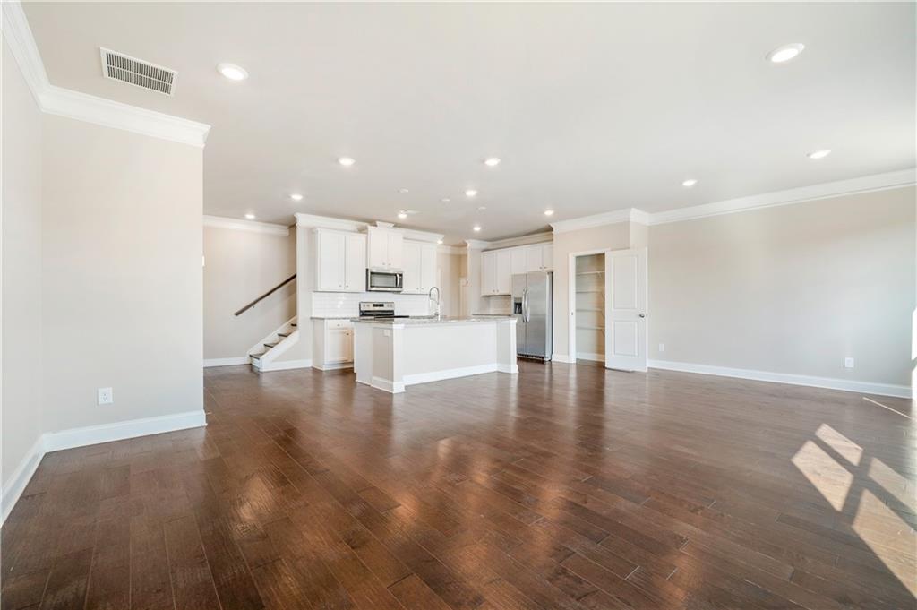 2747 Pearl Rdg Trace Buford, GA 30519 - Photo 10 of 41 a view of kitchen with kitchen island and stainless steel appliances