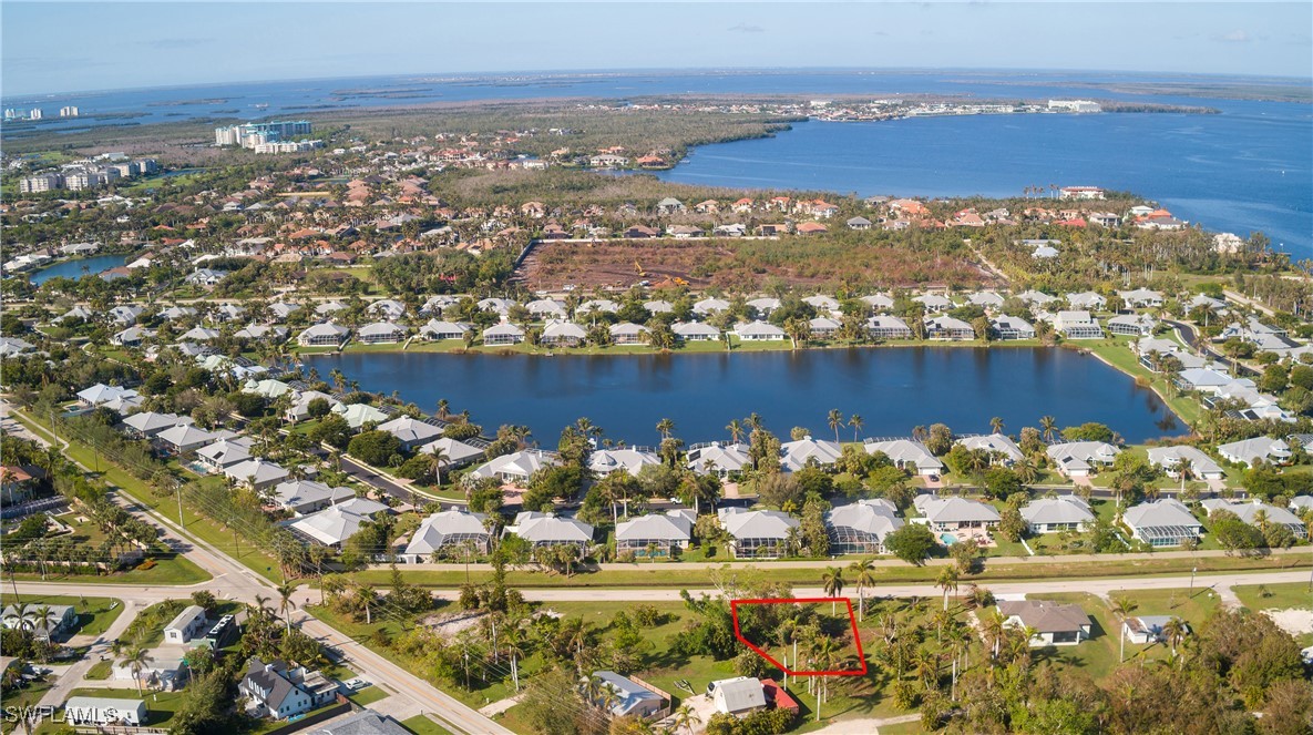 15691 John Morris Road Fort Myers, FL 33908 - Photo 6 of 25 an aerial view of residential houses with outdoor space
