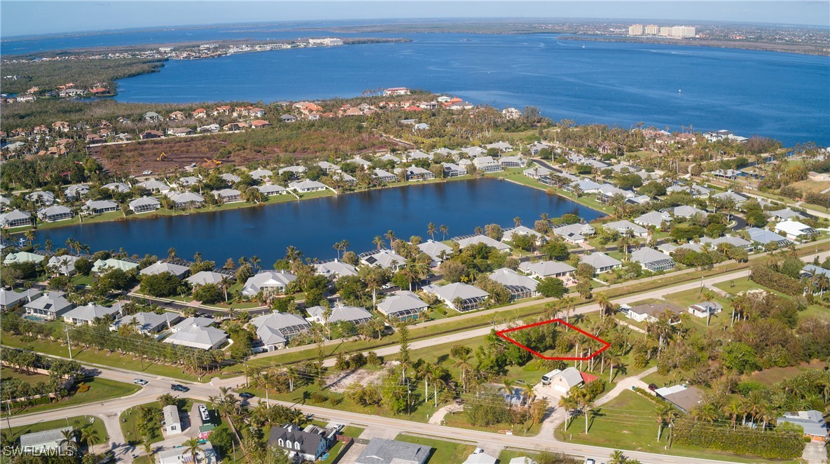 15691 John Morris Road Fort Myers, FL 33908 - Photo 7 of 25 view of a lake