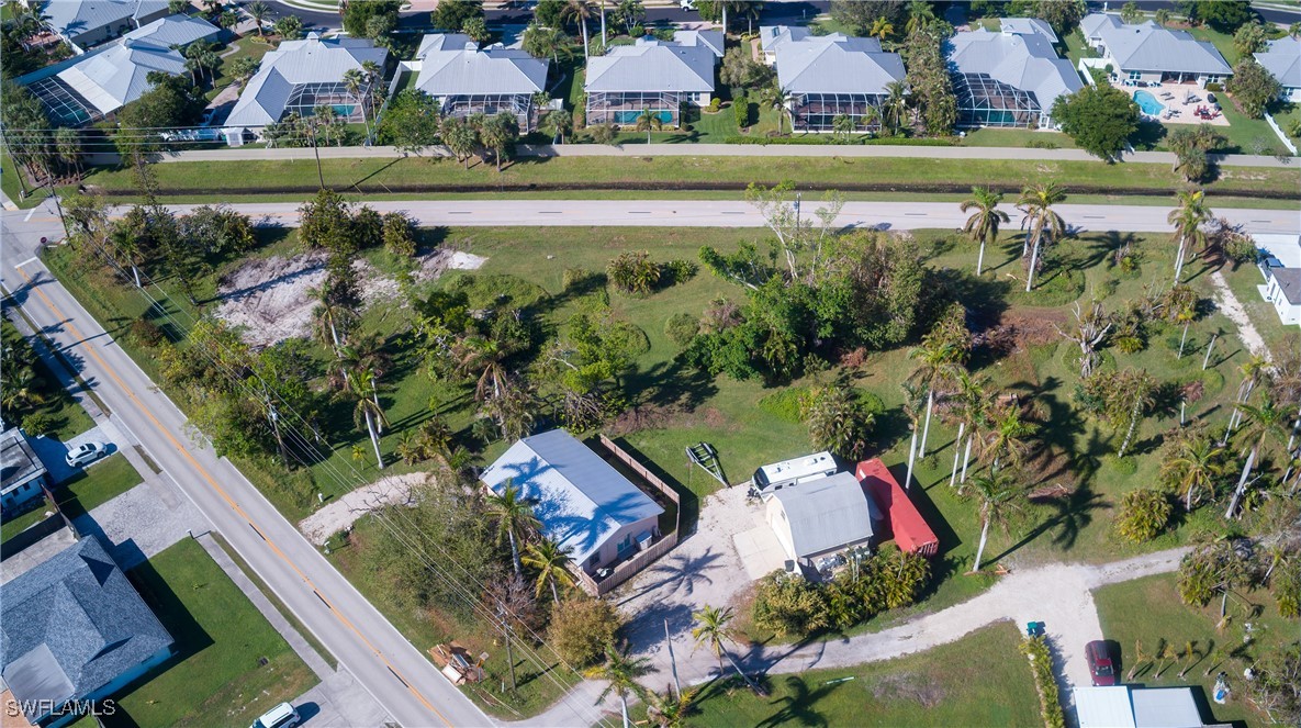 15691 John Morris Road Fort Myers, FL 33908 - Photo 9 of 25 an aerial view of a residential houses with outdoor space and street view